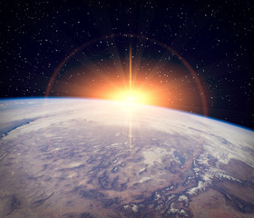 Highly detailed epic sunrise from space. The elements of this image furnished by NASA.