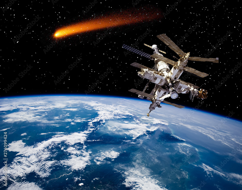 Canvas Prints space station above the earth. comets. the elements of this image furnished by nasa.