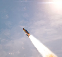 Space Launch System Takes Off into deep space. Launch with dust and smoke. Elements of this image furnished by NASA.