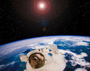 Earth globe and astronaut. Outer space. The elements of this image furnished by NASA. © wowinside