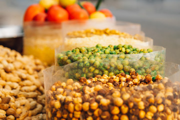 Variety of indian colored spices at flea market in India