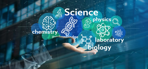 Businessman holding Science icons and title