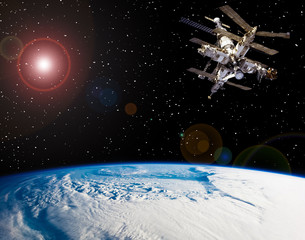 Space station above the earth. The elements of this image furnished by NASA.