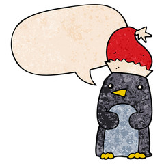 cute christmas penguin and speech bubble in retro texture style