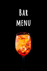 Stylish alcoholic aperol spritz trendy cocktail with orange slice on black background. Vertical photo.. Bar menu wording