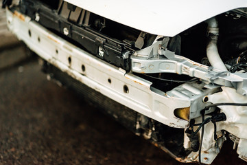 dents on the car door caused by an accident on the road