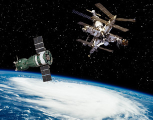 Earth space station and space craft or satellite. The elements of this image furnished by NASA.