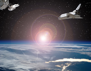 Astronaut and spaceships. Lens flare. The elements of this image furnished by NASA.