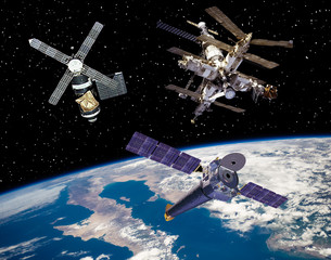 Satellite and spaceships. The elements of this image furnished by NASA.