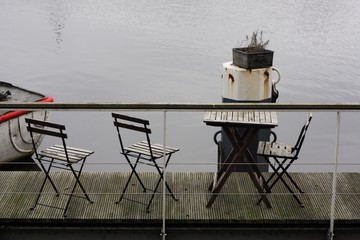 Street cafe by the river