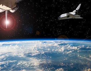 Shuttle flies in space. Other spaceship goes anywhere.  The elements of this image furnished by NASA.