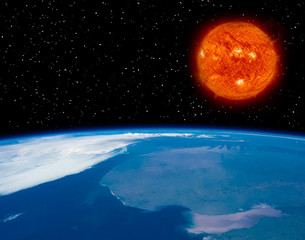 Earth and burning sun. Big star. The elements of this image furnished by NASA.