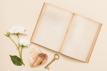 Top view of book and flowers