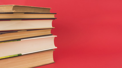 Stack of vintage hardcover books