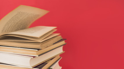 Stack of vintage hardcover books