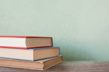 Stack of vintage hardcover books