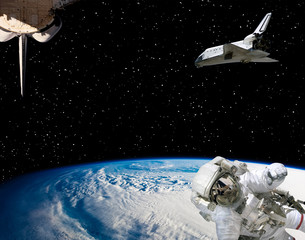 Astronaut and spaceships against earth. The elements of this image furnished by NASA.