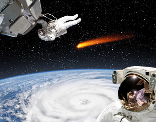 Astronaut and comet. The elements of this image furnished by NASA.