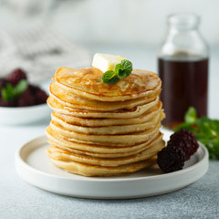Homemade pancakes with blackberry and syrup
