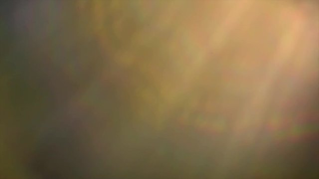 Lens flare effect on black background. Abstract sun burst, optical lensflares for screen mode using. Blurred sun rays. Slow motion. 3840X2160 4K UHD video footage