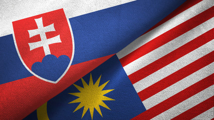 Slovakia and Malaysia two flags textile cloth, fabric texture