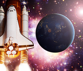 Rocket (shuttle) and earth globe. The elements of this image furnished by NASA.