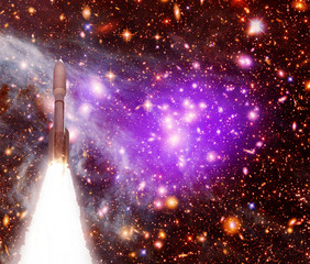 Flying rocket and galaxy, outer space. The elements of this image furnished by NASA.