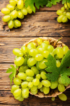 Sweet yellow grape with leaves