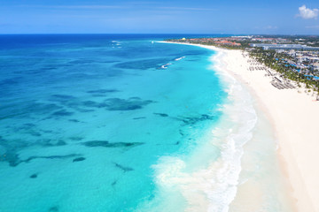Fototapeta na wymiar Aerial view from drone on caribbean beach of Atlantic ocean with luxury resorts