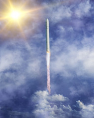 Sunflare and rocket. The elements of this image furnished by NASA.