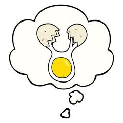 cartoon cracked egg and thought bubble