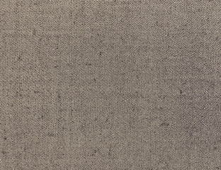 Fototapeta premium Textured background of brown natural textile 