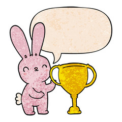 cute cartoon rabbit and sports trophy cup and speech bubble in retro texture style