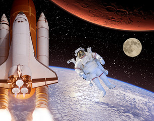 Rocket flies from earth to Mars. Astronaut and moon in the distance. The elements of this image furnished by NASA.