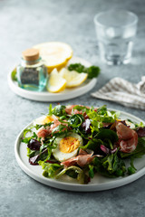 Green salad with eggs and smoked ham