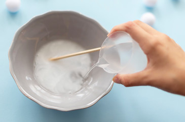 a girl making slime herself. child making slime. 