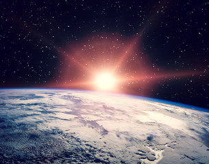 Sunflare and the earth from space. The elements of this image furnished by NASA.