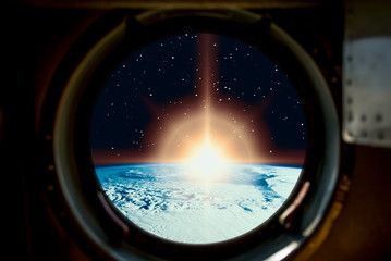 Sunrise, view from spaceship. Elements of this image furnished by NASA.
