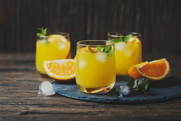 Fresh summer cocktail with orange and mint