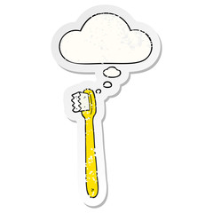 cartoon toothbrush and thought bubble as a distressed worn sticker