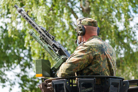 A german soldier on a machine gun