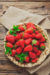 Summer sweet red strawberry on the wooden table