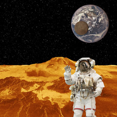 Astronaut on the alient planet. The elements of this image furnished by NASA.