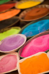 traditional egyptian multicolor sand in plates closeup background