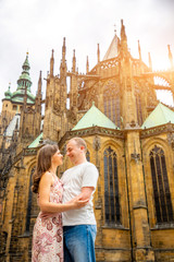 Young couple walking in old town of Prague