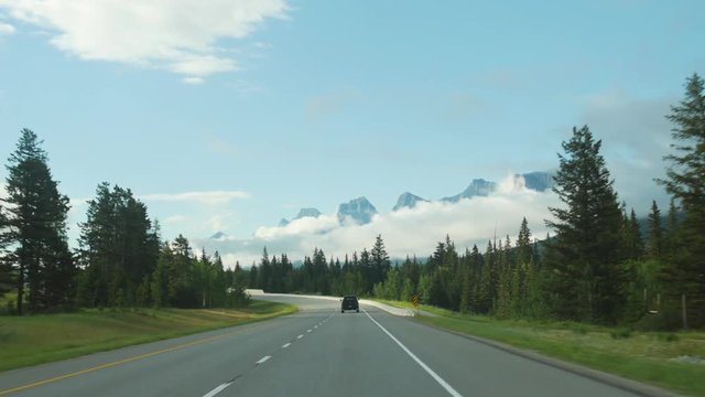 View from car driving along icefields parkway in Canada