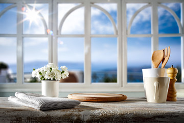 White wooden desk of free space for your decoration and summer window background. 