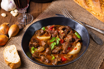classic beef goulash with peppers and onions