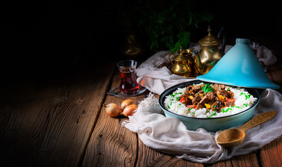 Tajin beef stew with rice paprika and sesame seeds