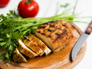 Grilled chicken breasts with vegetables